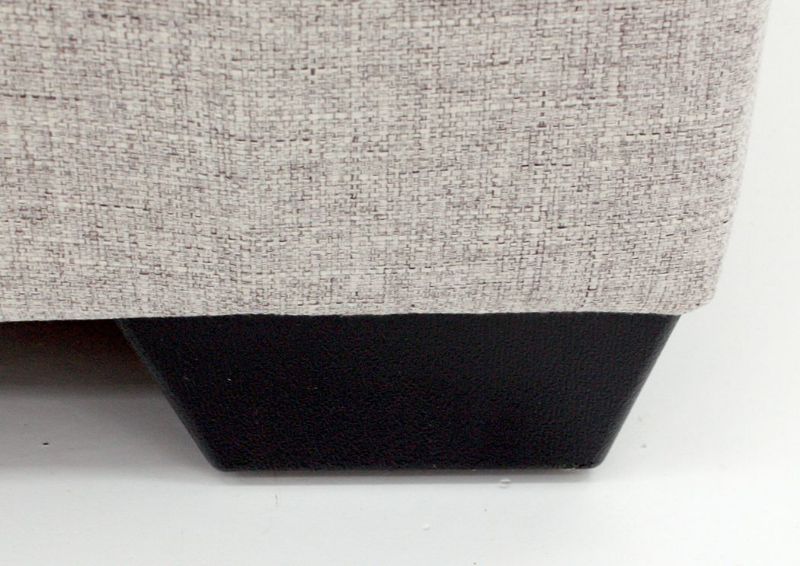 Close Up of Block Style Feet on the Velletri Collection by Ashley | Home Furniture + Mattress