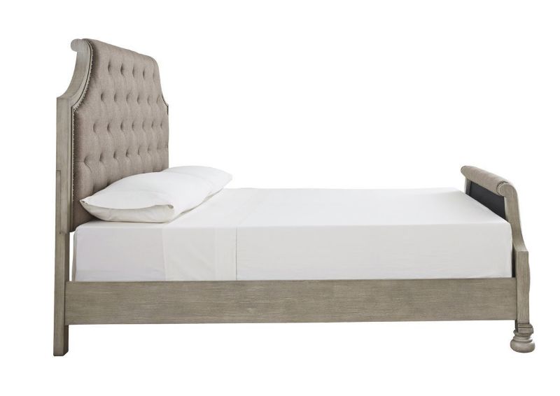 Side View of the Falkhurst King Size Upholstered Bed by Ashley Furniture | Home Furniture Plus Bedding