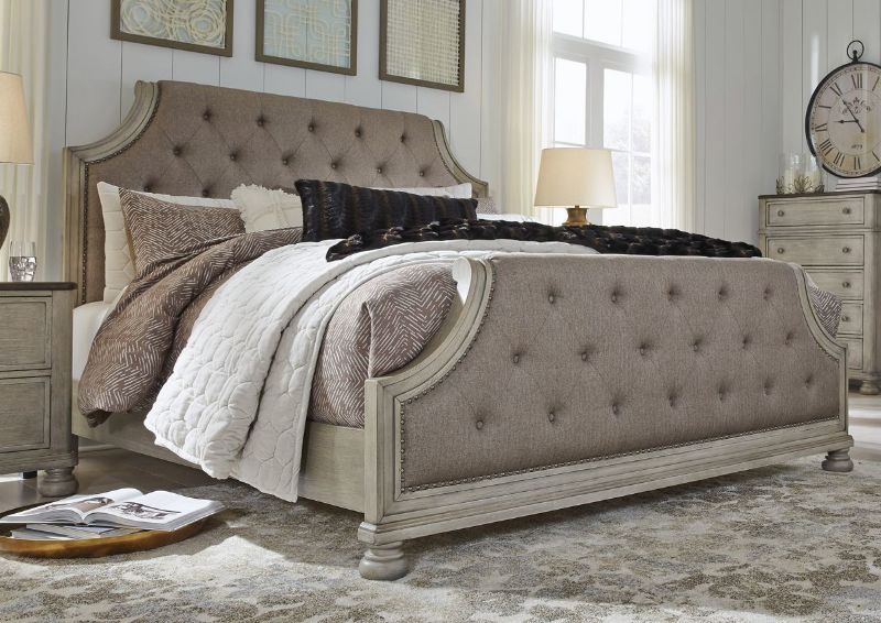 Slightly Angled Room View of the Falkhurst King Size Upholstered Bed by Ashley Furniture | Home Furniture Plus Bedding