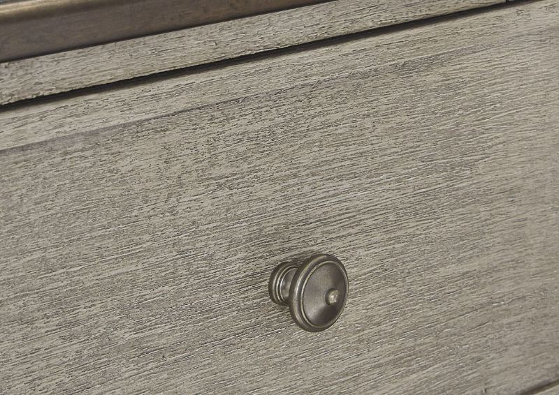 Close Up View of the Drawer Knob Hardware on the Falkhurst 5 Drawer Chest of Drawers by Ashley Furniture | Home Furniture Plus Bedding