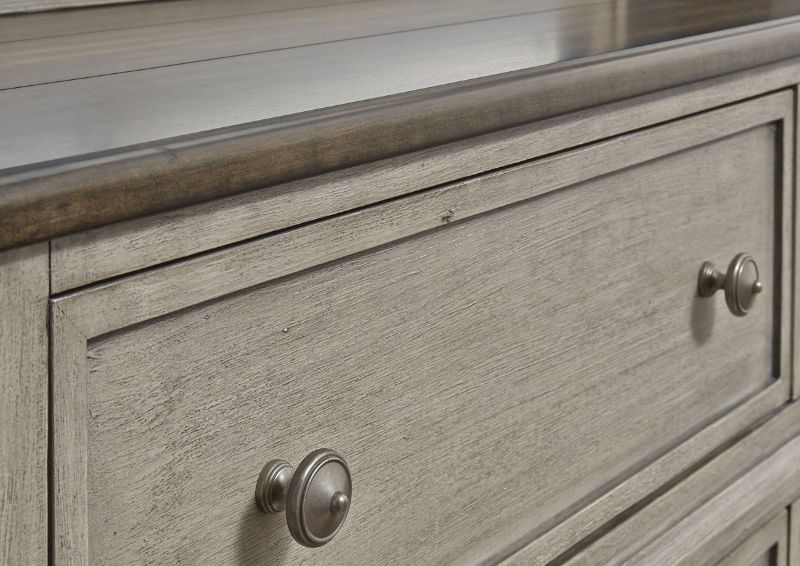 Close Up View of the Drawer Knob Hardware on the Falkhurst 5 Dresser by Ashley Furniture | Home Furniture Plus Bedding