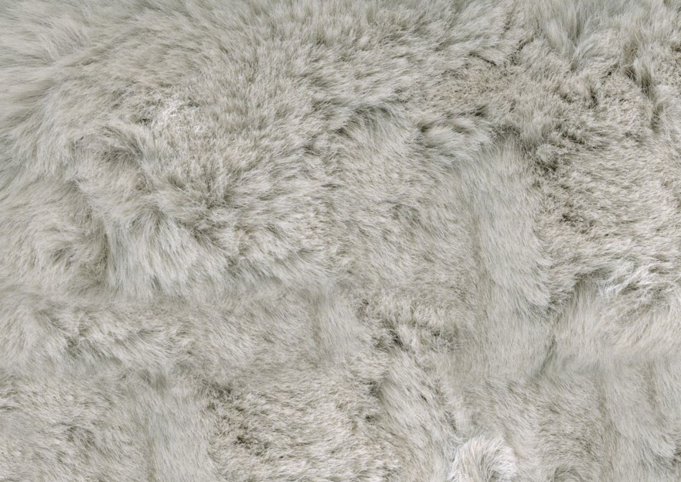Plush Solid Gray Accent Pillow Fabric on the Mercado Sofa by Ashley Furniture | Home Furniture Plus Bedding