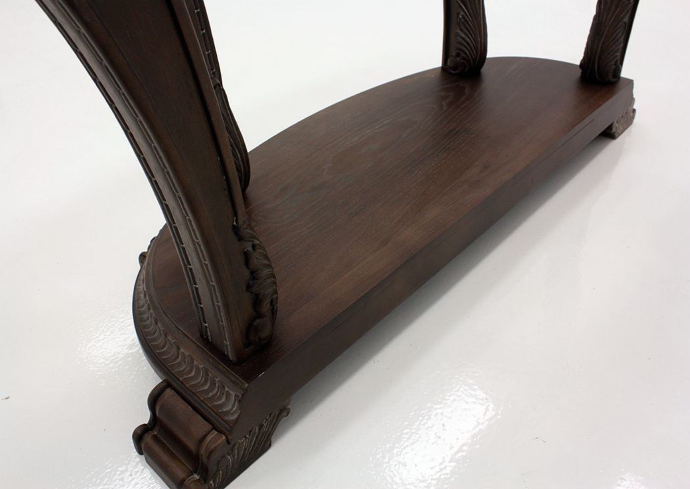 Brown Charmond Round Sofa Table by Ashley Furniture Showing the Lower Shelf  | Home Furniture Plus Bedding
