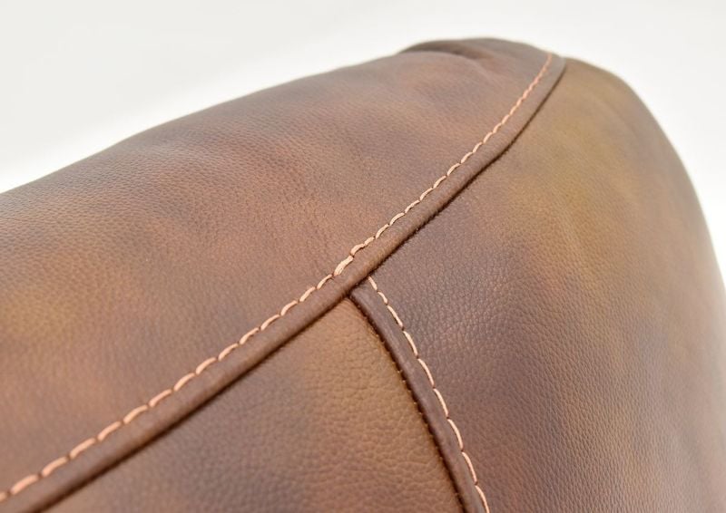 Close Up of the Accent Stitching the Top Back Cushion on the Legend Leather Reclining Sofa | Home Furniture Plus Bedding