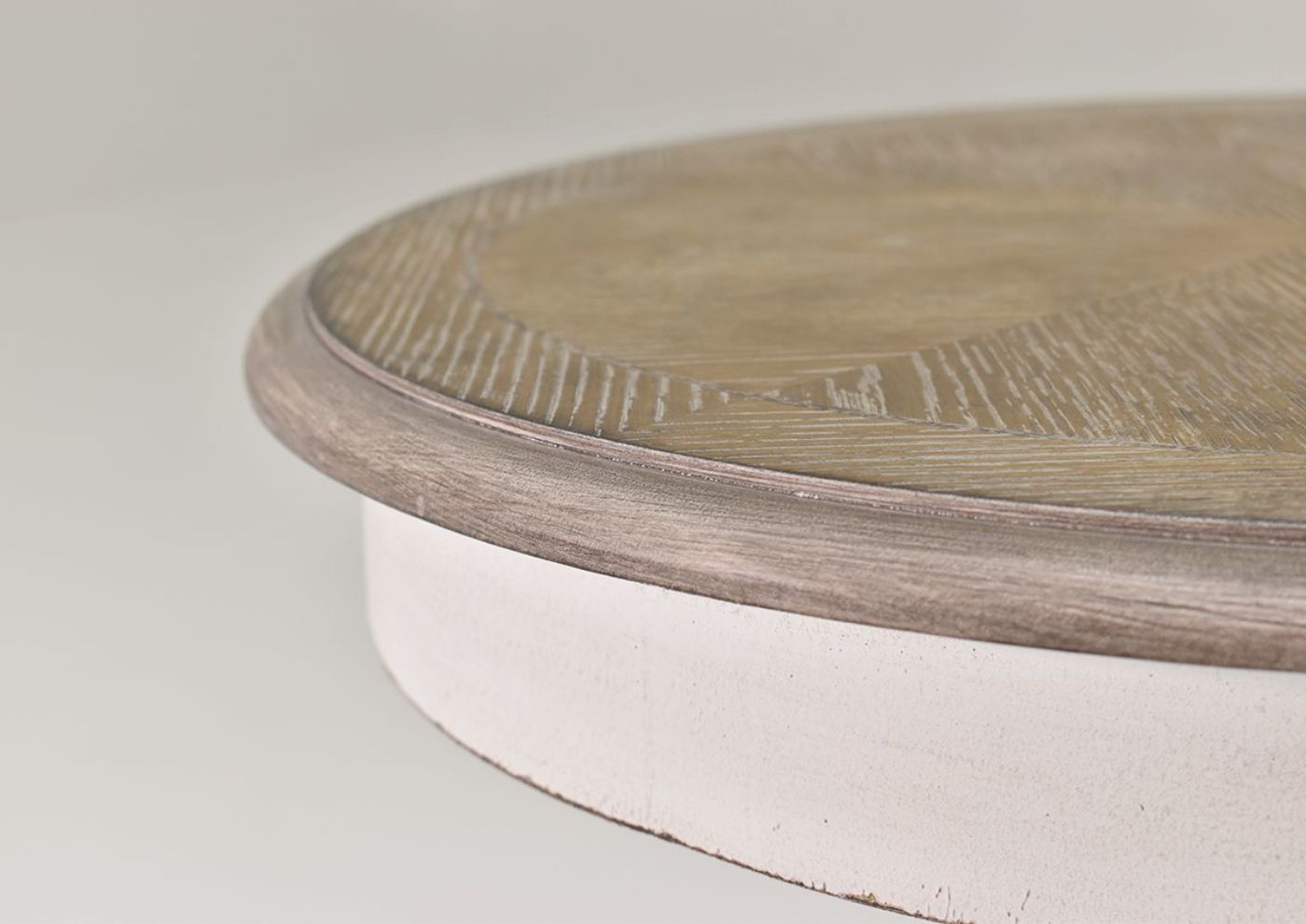 Close Up View of the Side Edge of the Magnolia Manor Round End Table | Home Furniture Plus Bedding