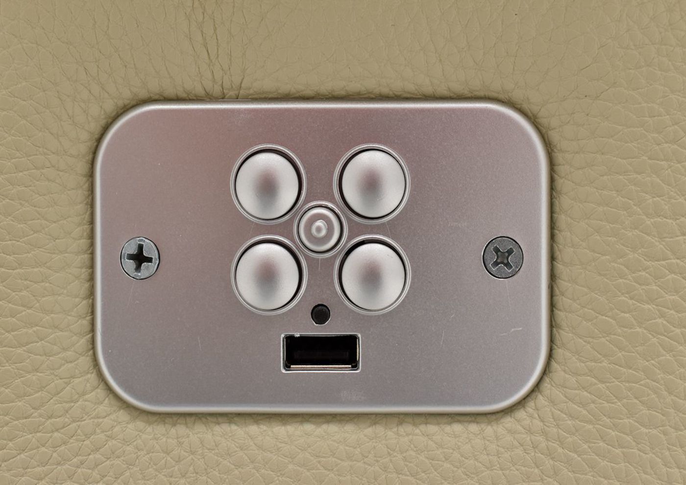 Close Up of the Power Button on the Spartacus POWER Reclining Loveseat in Off White | Home Furniture Plus Bedding