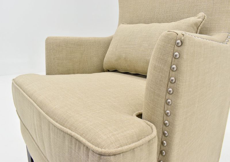 Close up view of the lumbar pillow and nailhead trim on the Kori Accent Chair in Off White by Elements International | Home Furniture Plus Bedding