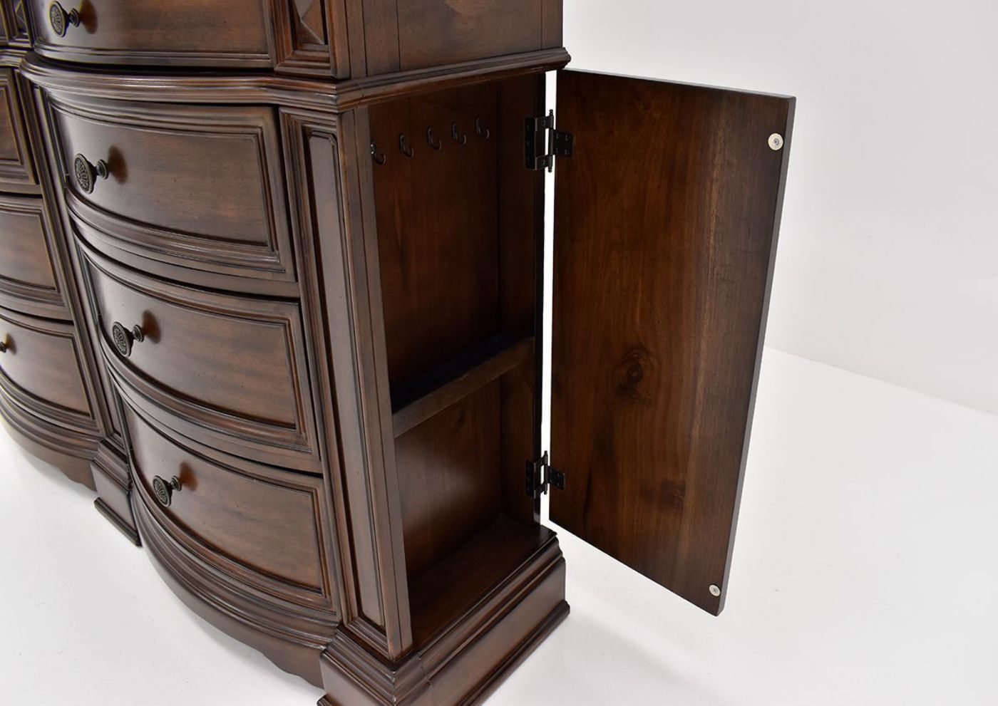 View of the Hidden Jewelry Storage on the Side of the Plaza Dresser in Brown by Avalon Furniture | Home Furniture Plus Bedding