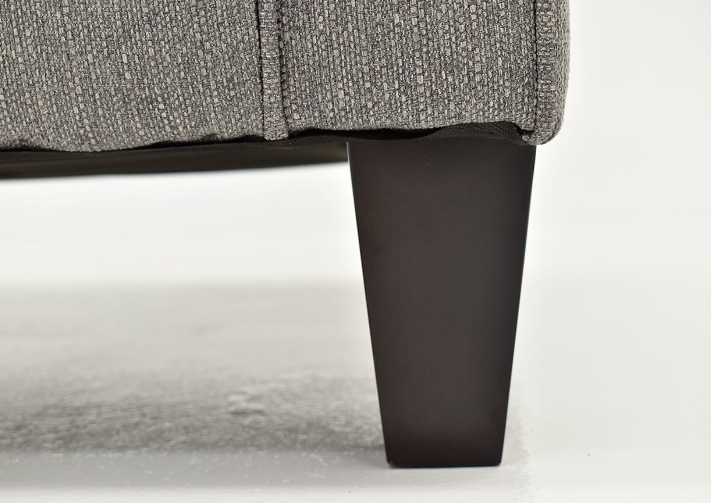 Close Up View of the Tapered Leg on the Gray Bay Ridge Chair by Behold, Made in the USA | Home Furniture Plus Bedding