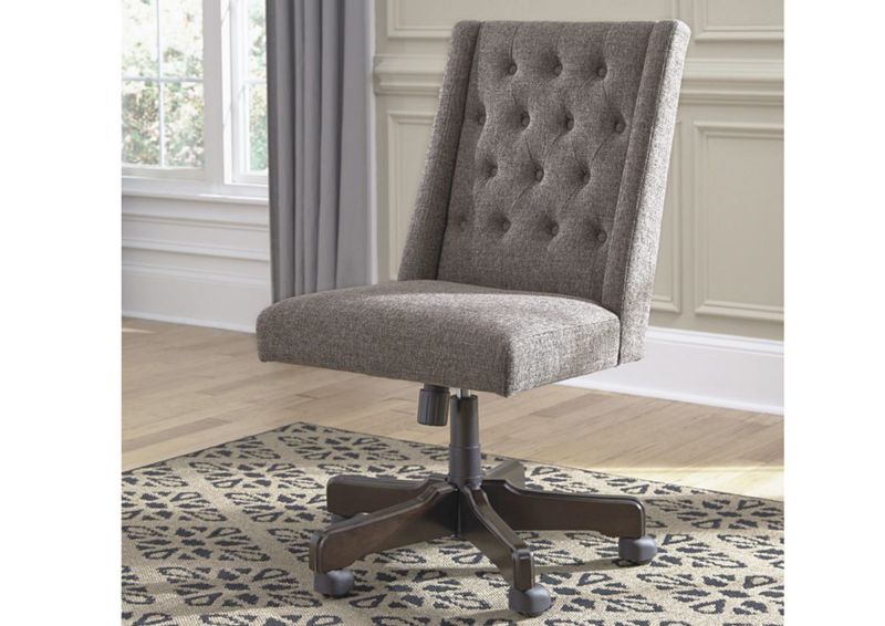Slightly Angled View of the Graphite Swivel Desk Chair by Ashley Furniture In a Room Setting | Home Furniture Plus Bedding