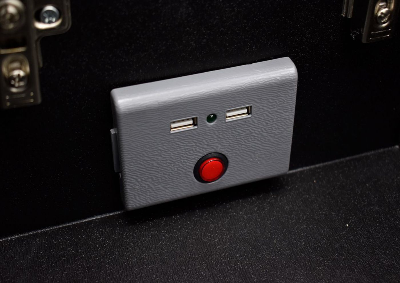 Close Up View of the USB Ports inside the Center Storage Console on the Aiden Reclining Loveseat by Man Wah | Home Furniture Plus Bedding