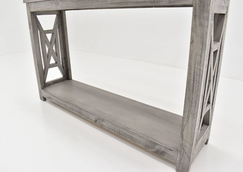 Slightly Angled View of the Lower Shelf and Side Details on  the Grande Sofa Table by Vintage Furniture, LLC | Home Furniture Plus Bedding