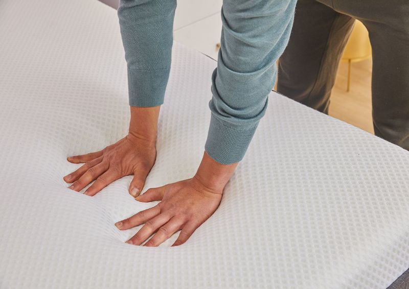 View of Hands Pressing Down on the Nectar Premier Twin Size Mattress | Home Furniture Plus Bedding