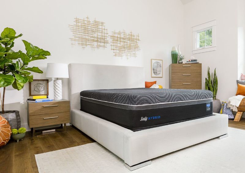 Slightly Angle View of the Sealy Hybrid Premium Silver Chill Firm Queen Size Mattress In a Room Setting | Home Furniture Plus Bedding