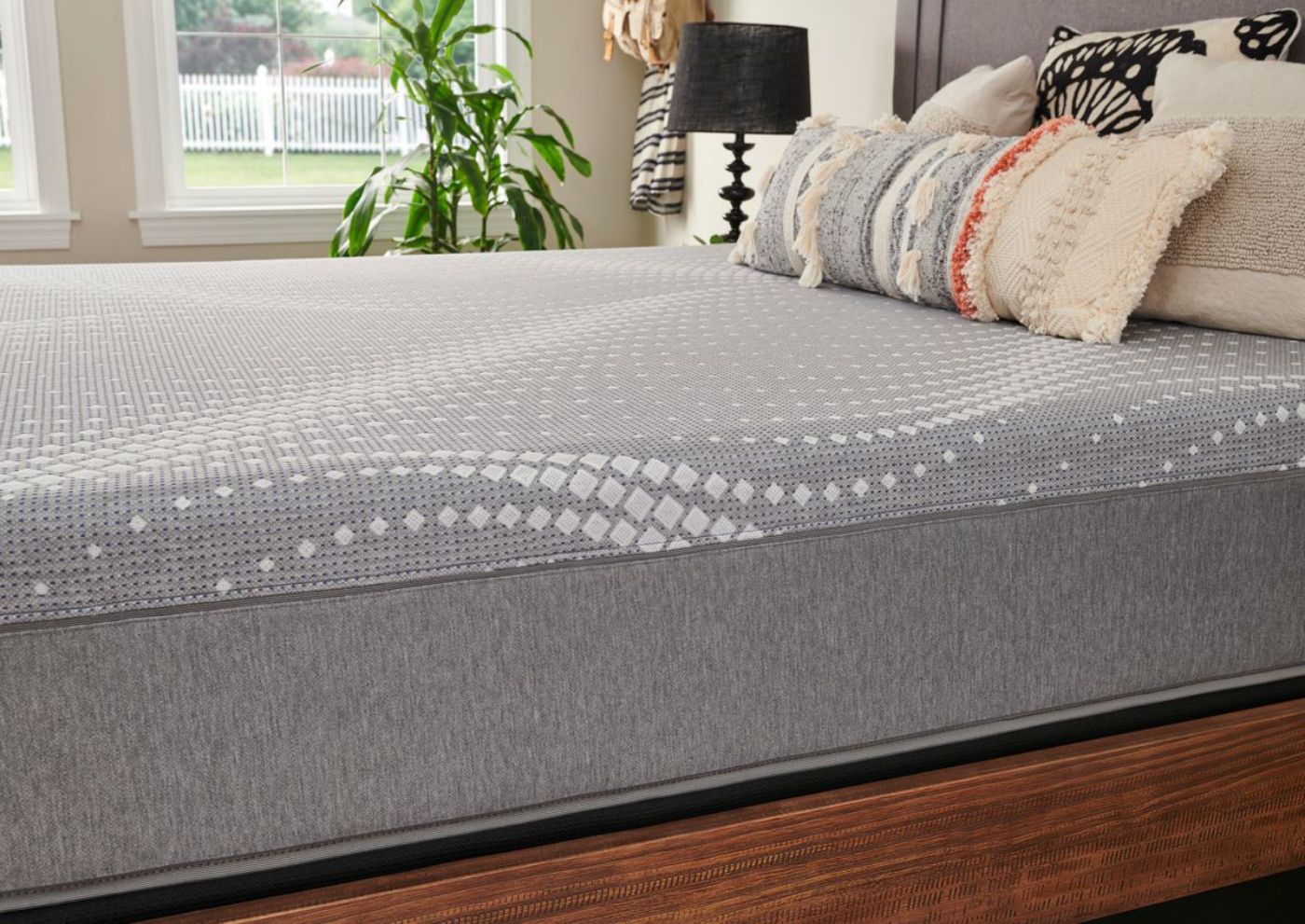 Closeup Angled Room View of the Sealy Posturepedic Hybrid Paterson Medium Mattress in Twin XL Size | Home Furniture Plus Bedding