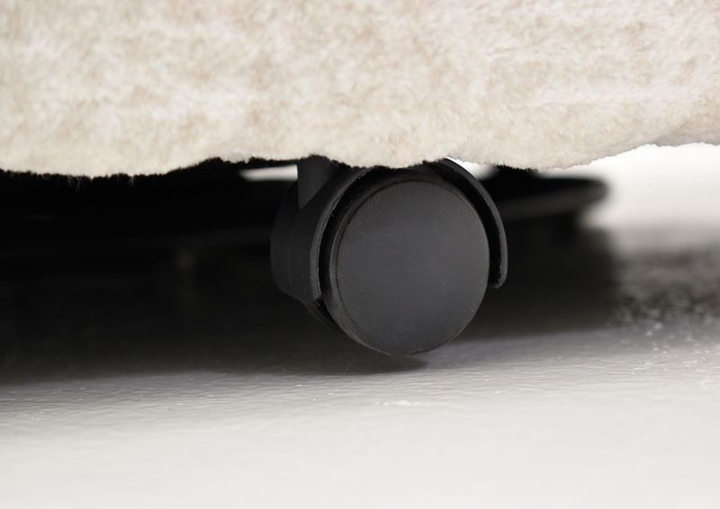 Close Up of one of the Caster Wheels on the Gabriella Swivel Chair | Home Furniture Plus Bedding