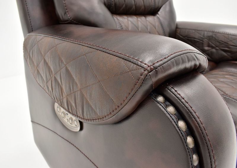 Close Up View of the Arm with Decorative Padding and Nailhead Trim on the Granger POWER Recliner in Chocolate Brown by Vogue Home Furnishings | Home Furniture Plus Bedding