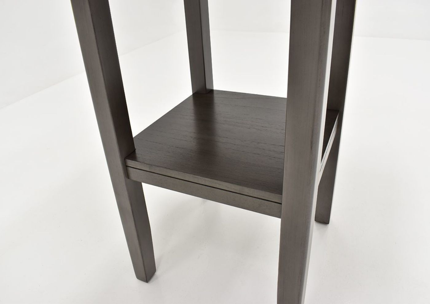 Slightly Angled View of the Under-the-Table Shelf of the Tahoe 5-Piece Counter Height Dining Table Set in Cool Gray by Crown Mark | Home Furniture Plus Bedding