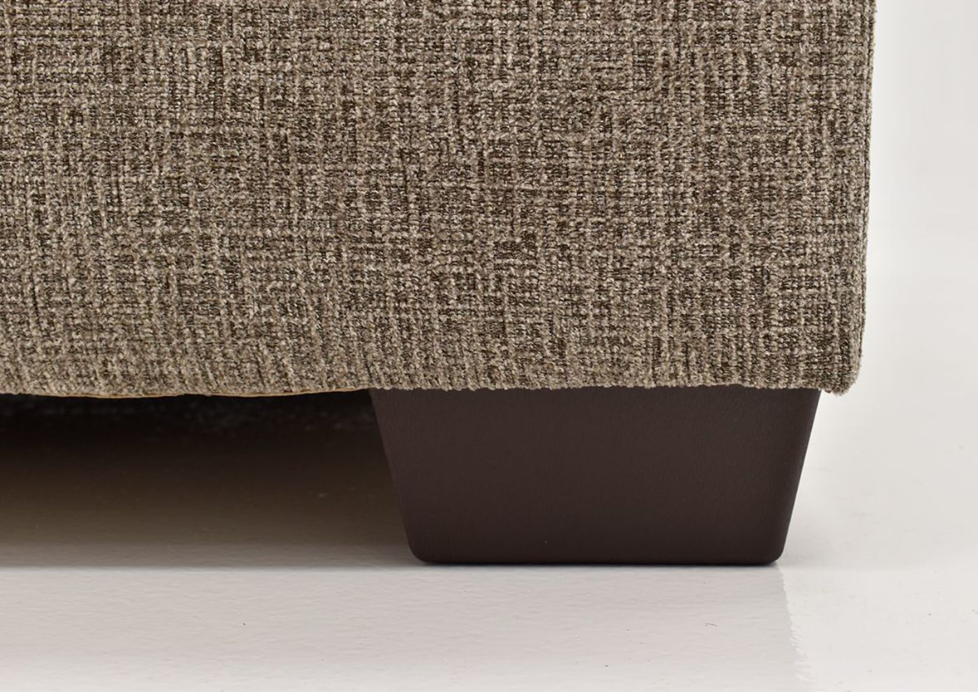 Close Up View of the Foot on the Perth Sectional Sofa in Pewter by Peak Living Furniture | Home Furniture Plus Mattress
