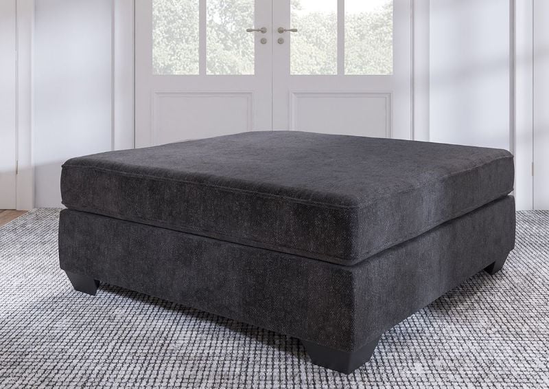Room View of the Lavernett Ottoman in Charcoal Gray by Ashley Furniture | Home Furniture Plus Bedding