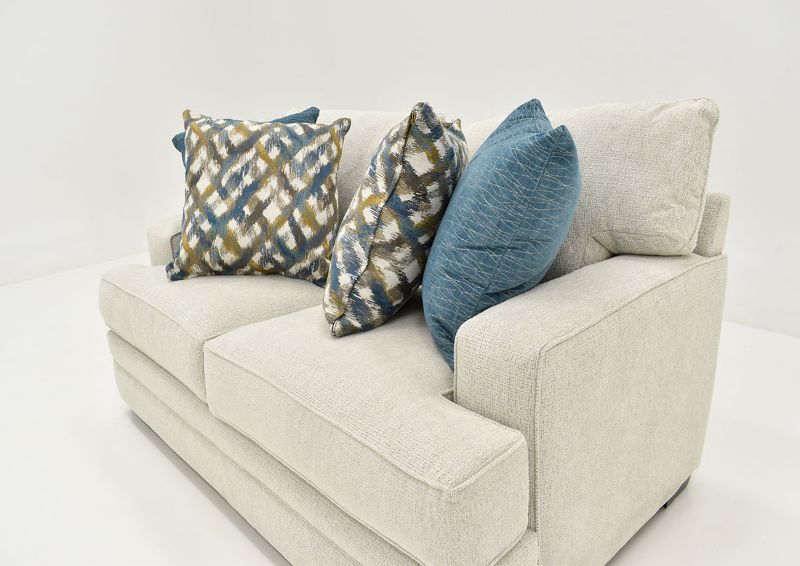 Angled View of the Rowan Loveseat in Off White by Franklin Furniture Showing Arms and Pillows | Home Furniture Plus Bedding
