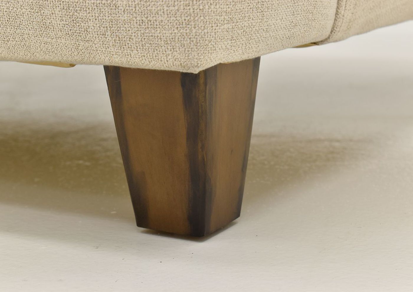 Closeup View of the Foot on the Kaia Sofa in Off White by Franklin Furniture | Home Furniture Plus Bedding