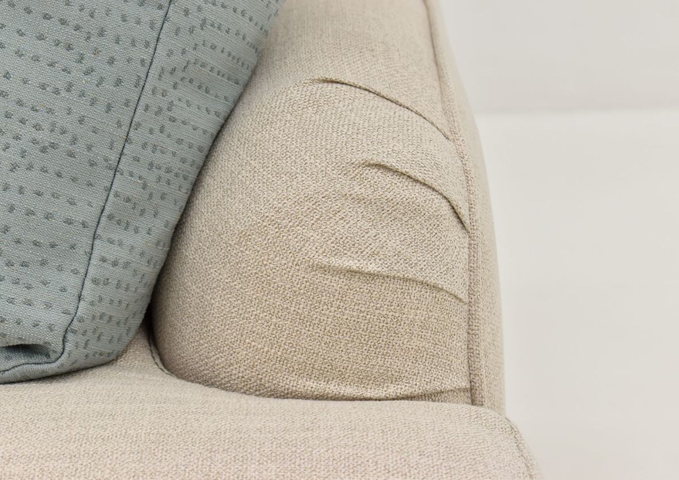 Closeup View of the Kaia Sofa in Off White by Franklin Furniture Showing Arm and Pillow Details | Home Furniture Plus Bedding