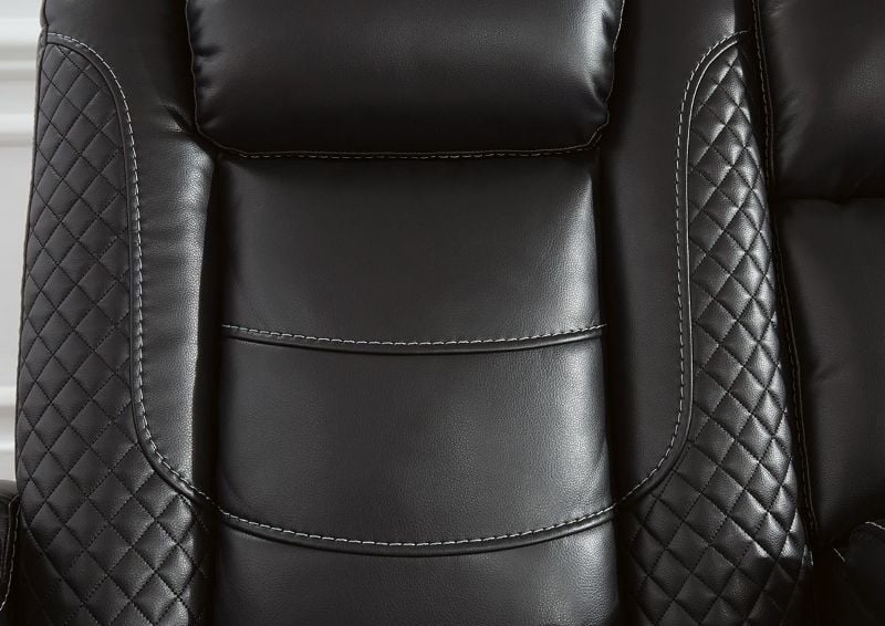 Close Up of the Seat Back on the Party Time POWER Reclining Sofa in Midnight Black by Ashley Furniture | Home Furniture Plus Bedding