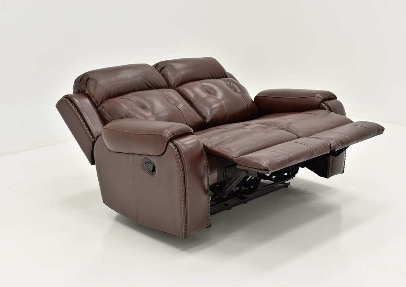Angle View of the Reclined Rosewood Leather Reclining Loveseat in Warm Brown by Behold Home | Home Furniture Plus Bedding