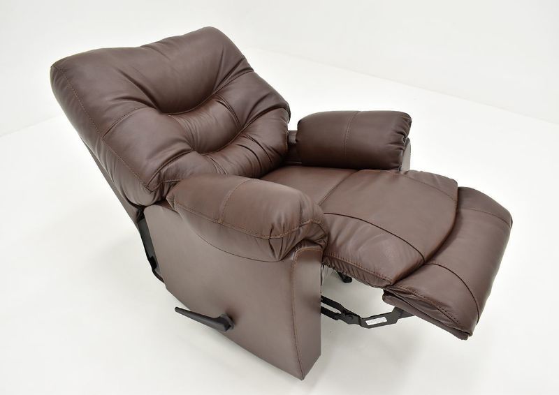 Angled View of the Reclined Trilogy Leather Rocker Recliner in Dark Brown by Franklin Corporation | Home Furniture Plus Bedding