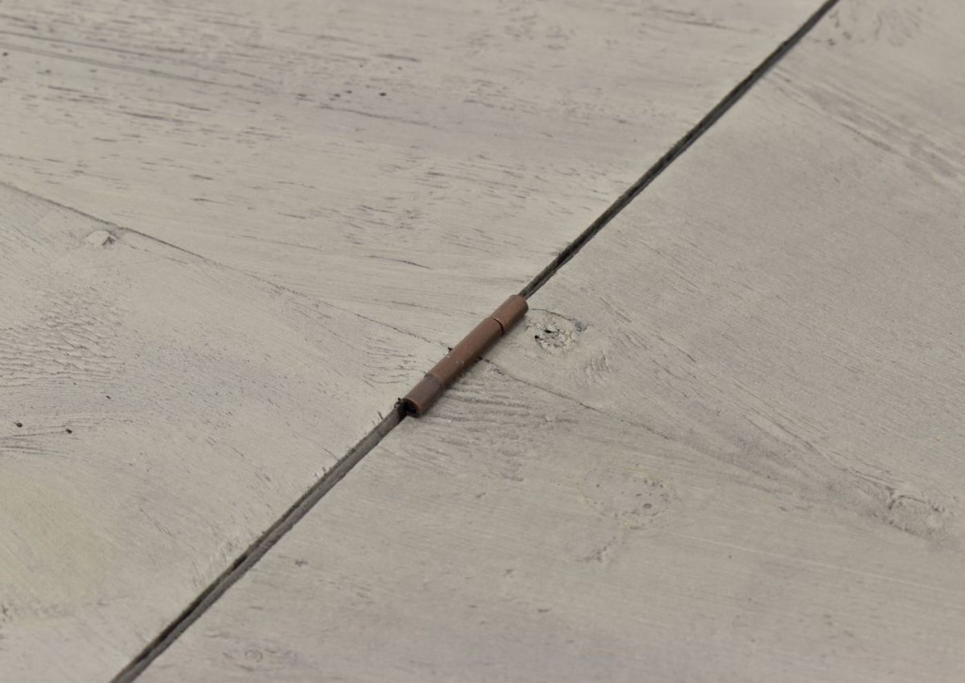 Close Up View of the Outer Hinge on the Carson Lift Top Coffee Table in Granite by Vintage Furniture | Home Furniture Plus Bedding
