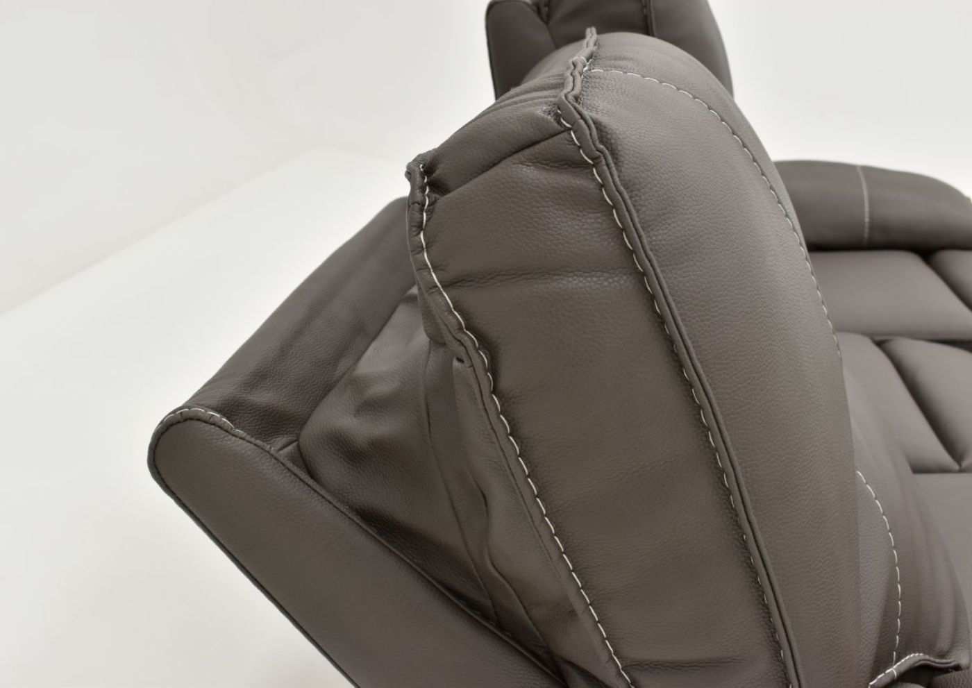 Close Up View of the Adjustable Headrest on the Spartacus POWER Reclining Sofa in Haze Gray by Parker House Furniture | Home Furniture Plus Bedding
