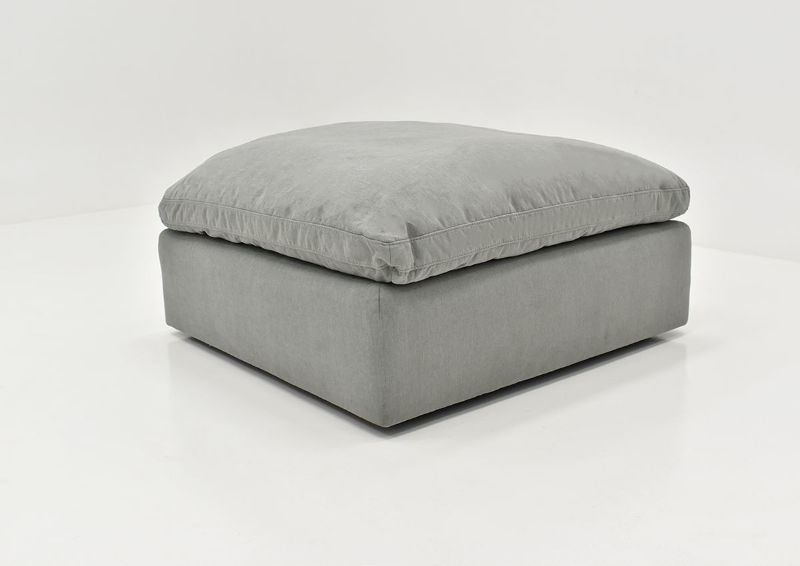 Slightly Angled View of the Cloud Ottoman in Gray by KUKA Home | Home Furniture Plus Bedding