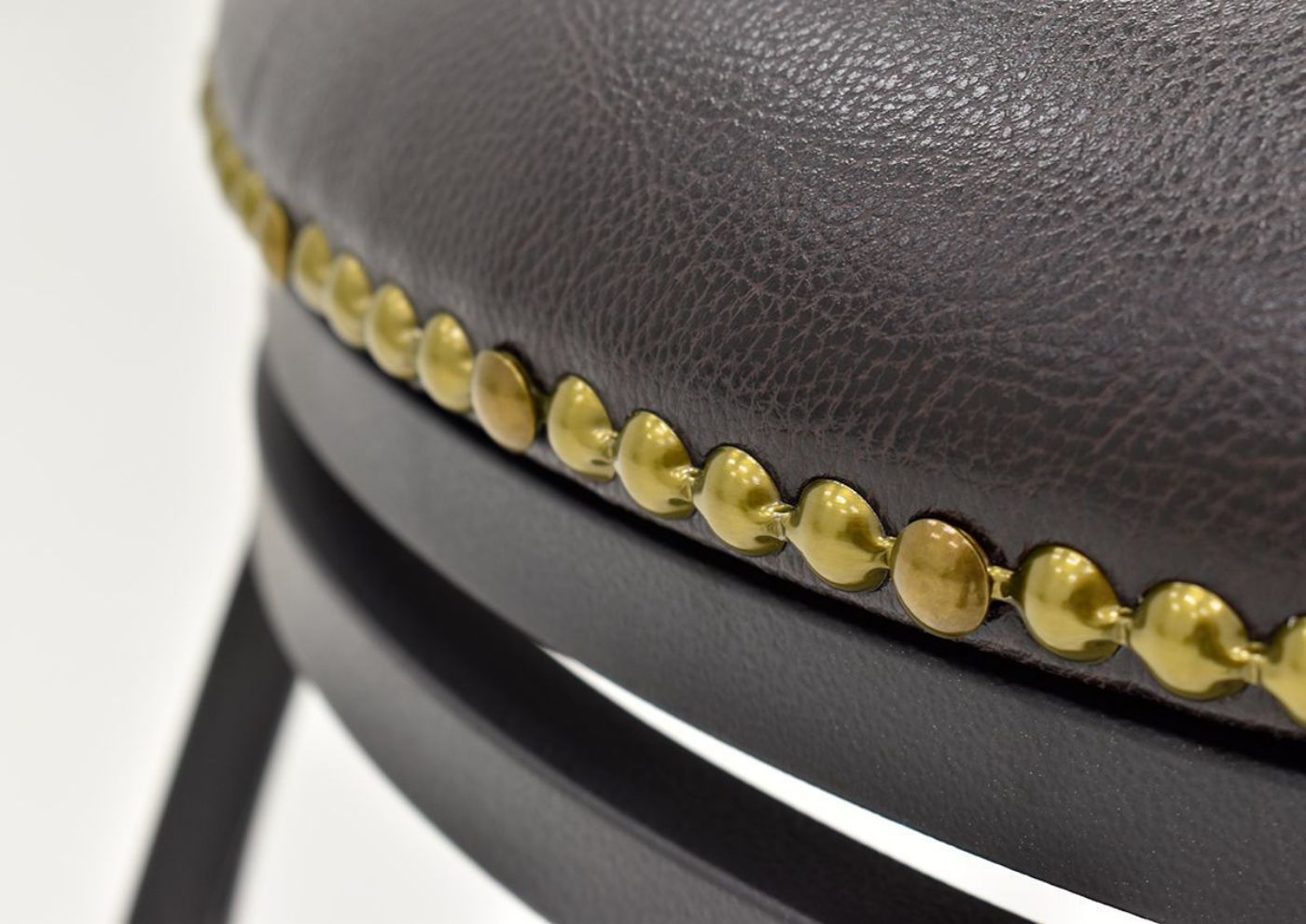 Close Up of the Nailhead Accents on the Garcia 24 Inch Barstool - Dark Brown | Home Furniture Plus Bedding