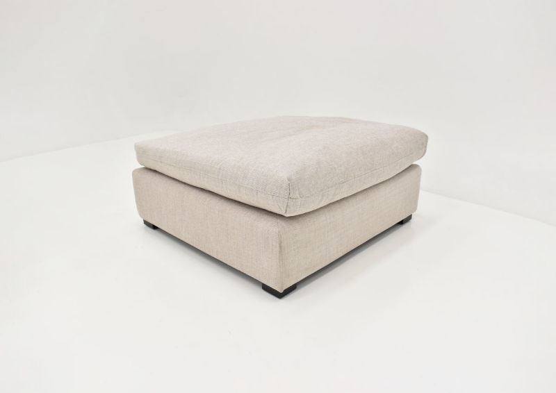 Slightly Angled View of the Valley Ottoman in Off White by Behold Home | Home Furniture Plus Bedding