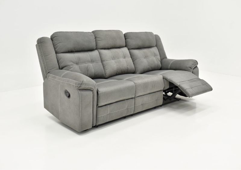 Slightly Angled View of the Keystone Reclining Sofa in Gray with Footrest Extended by Lane Home Furnishings | Home Furniture Plus Bedding