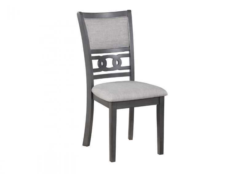 Slightly Angled View of the Gia Dining Chair in Gray by New Classic Furniture | Home Furniture Plus Bedding