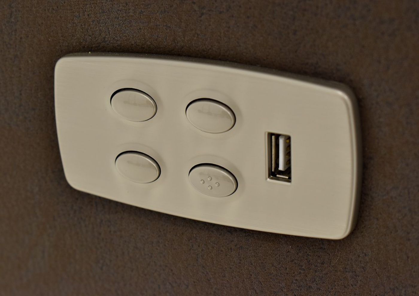 Close Up View of the Power Controls and USB Port on the Dakota POWER Reclining Sectional Sofa in Brown by KUKA Home | Home Furniture Plus Bedding