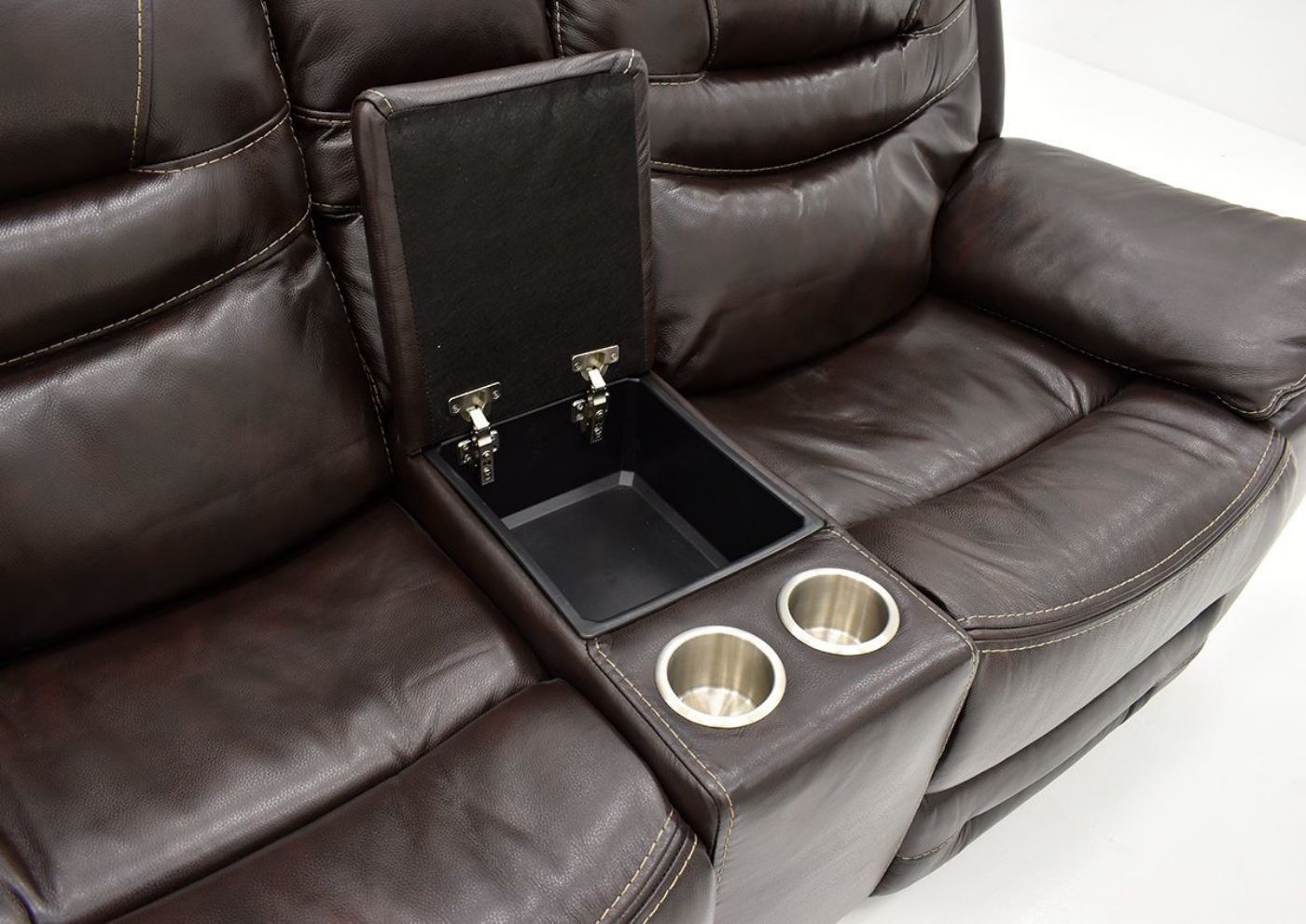 Close Up View of the Center Console and Cupholders on the Dallas POWER Reclining Loveseat in Brown | Home Furniture Plus Bedding