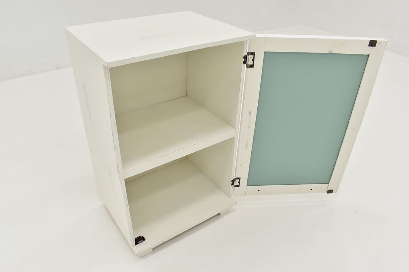 Slightly Angled View with Cabinet Door Open, showing 2 interior storage spaces with shelf on the Fish Accent Cabinet - White | Home Furniture Plus Bedding