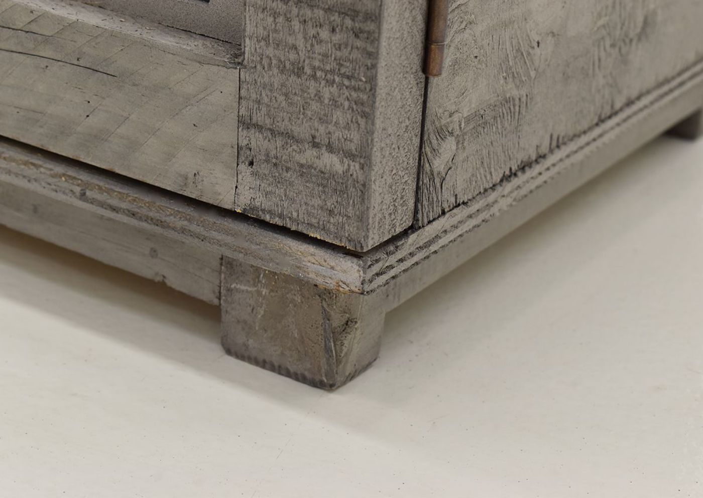 Close Up of the Front Lower Corner on the Fish Accent Cabinet - Granite Gray | Home Furniture Plus Bedding