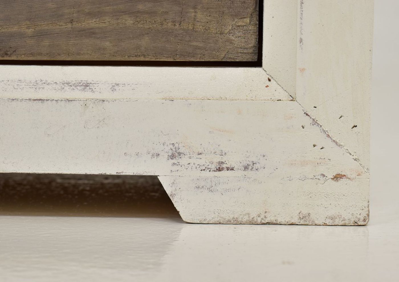 Close Up View of the Foot of the  Two-Tone White with Brown Windjammer Chest of Drawers by Vintage Furniture | Home Furniture Plus Bedding