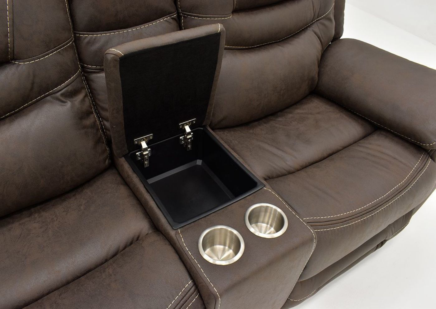 Close Up View of the Center Console on the Dakota POWER Reclining Loveseat in Brown by KUKA Home | Home Furniture Plus Bedding