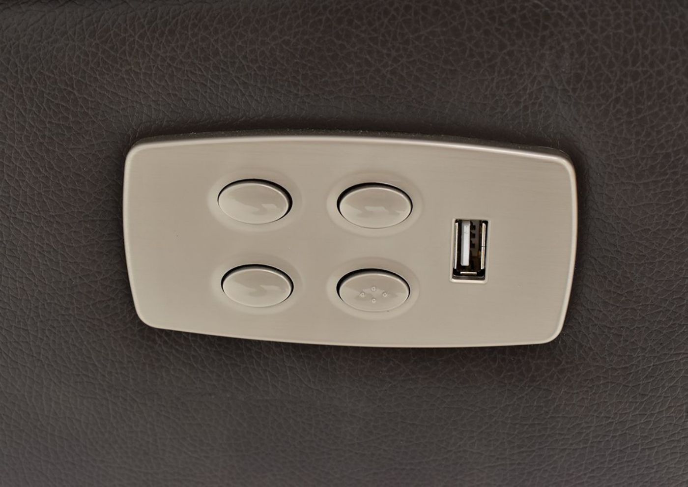 Close Up View of the USB Port and Power Controls on the GRAY Dallas POWER ACTIVATED Reclining Sectional Sofa by KUKA Home | Home Furniture Plus Bedding
