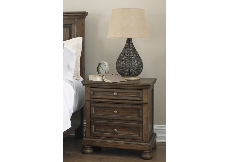 Room View of the Tobacco Brown Flynnter Nightstand by Ashley Furniture | Home Furniture Plus Bedding