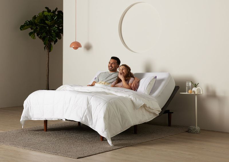 Room View of a Couple on the Purple Ascent Adjustable Base in King Size  | Home Furniture Plus Bedding