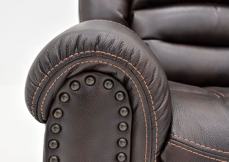 Close Up View of the Arm and Nailhead Trim on the Torino Reclining Sofa Set in Brown by Man Wah | Home Furniture Plus Bedding