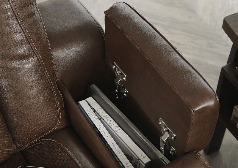 Close Up View of the Armrest Storage on the Man-Den Power Reclining Loveseat in Mahogany Brown by Ashley Furniture | Home Furniture Plus Bedding