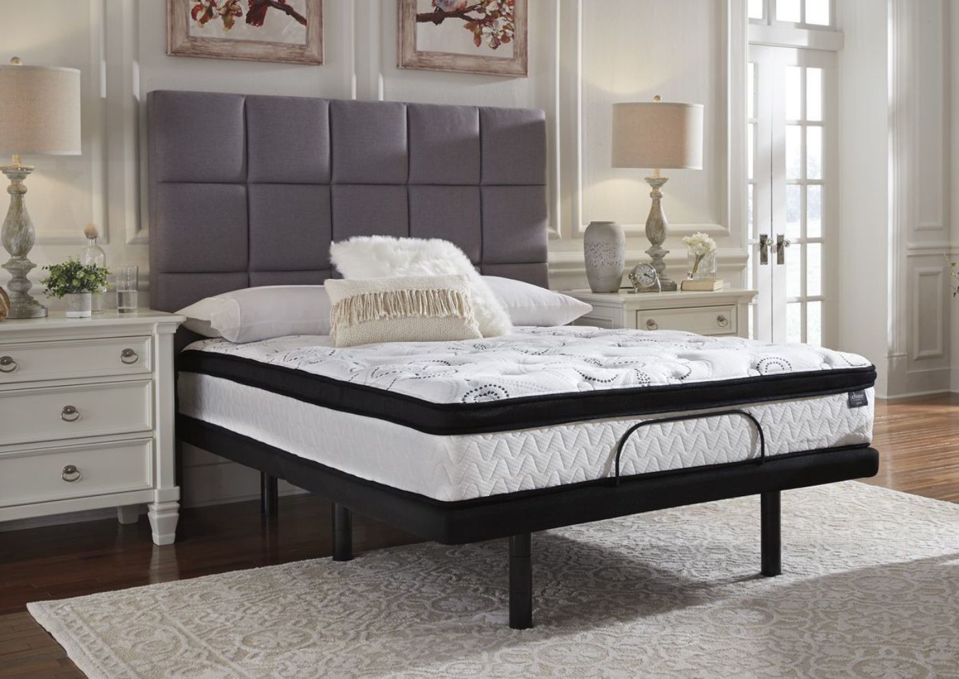 Chime 12 Inch Hybrid Mattress by Ashley Furniture Showing the Mattress on an Adjustable Base | Home Furniture Plus Bedding