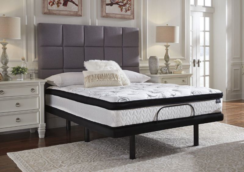Chime 12 Inch Hybrid Mattress by Ashley Furniture Showing the Mattress on an Adjustable Base | Home Furniture Plus Bedding